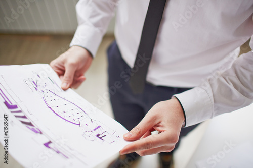 Photo: Holding sketch Holding sketch