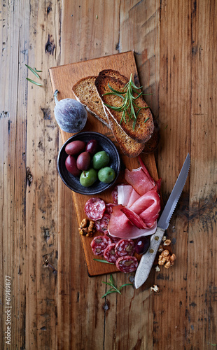 Photo: Mediterranean-Style Antipasto on Wooden Board Mediterranean-Style Antipasto on Wooden Board