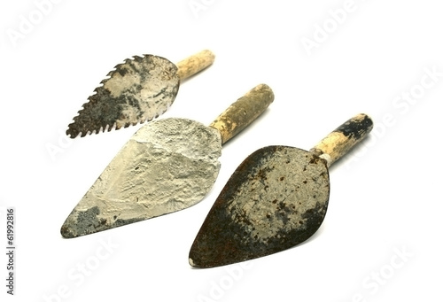 Photo: old trowel isolated on white old trowel isolated on white