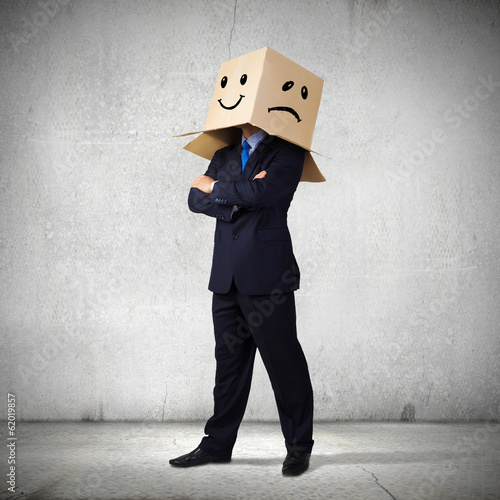 Photo: Businessman with box on head Businessman with box on head