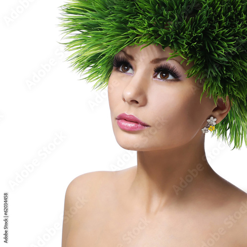Photo: Spring Woman. Beautiful Girl with Green Grass Hair. Fashion Spring Woman. Beautiful Girl with Green Grass Hair. Fashion