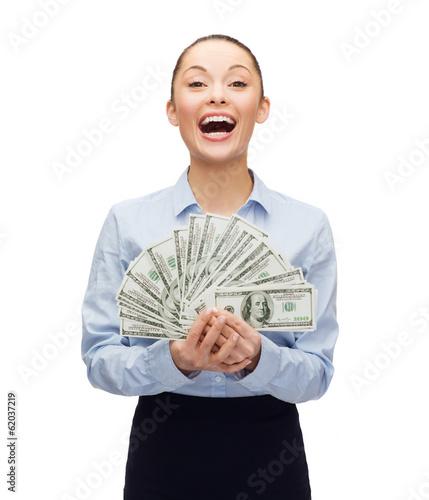 Photo: young businesswoman with dollar cash money young businesswoman with dollar cash money