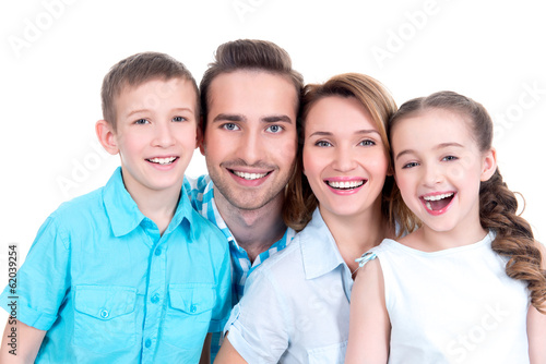 Photo: Portrait of the happy european family with children Portrait of the happy european family with children