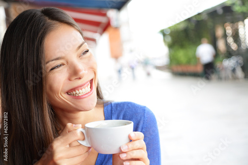 Photo: Woman in Venice, Italy at cafe drinking coffee Woman in Venice, Italy at cafe drinking coffee