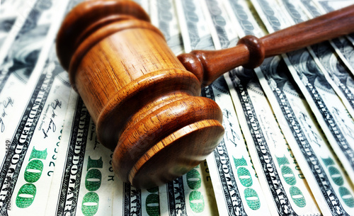 Photo: gavel and cash money gavel and cash money