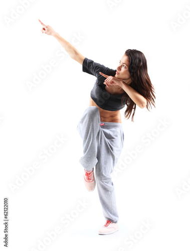 Photo: pretty modern slim hip-hop style teenage girl jumping dancing pretty modern slim hip-hop style teenage girl jumping dancing