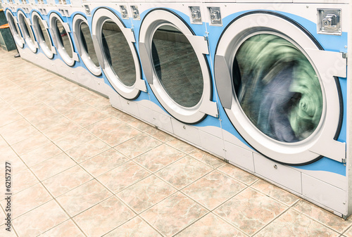 Photo: Industrial washing machines in a public Laundromat - Automatic L Industrial washing machines in a public Laundromat - Automatic L