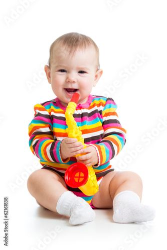 Photo: baby playing musical toy baby playing musical toy