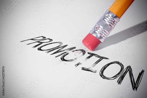 Photo: Pencil erasing the word Promotion Pencil erasing the word Promotion