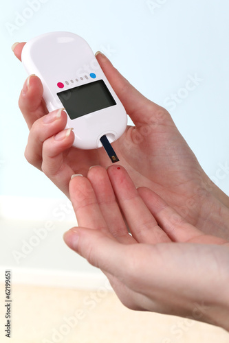 Photo: Measuring glucose level blood close-up Measuring glucose level blood close-up