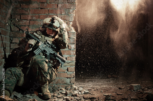 Photo: U.S. marine hiding from explosion U.S. marine hiding from explosion