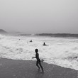 a boy plays with ball on copacabana beach Rio de Janeiro, Brazil a boy plays with ball on copacabana beach Rio de Janeiro, Brazil