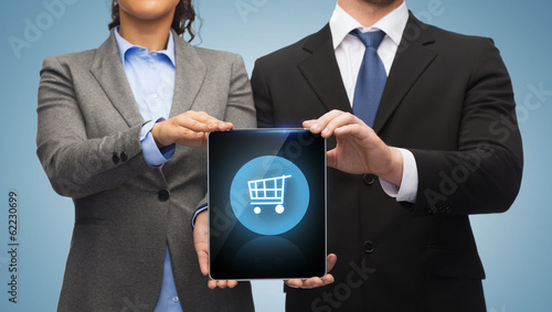 Photo: businessman and businesswoman with tablet pc businessman and businesswoman with tablet pc