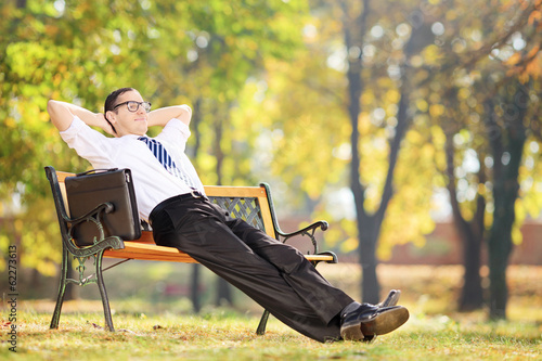 Photo: Young businessman taking a break after work Young businessman taking a break after work