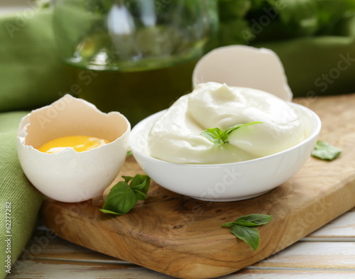 Photo: natural egg mayonnaise sauce in a white bowl natural egg mayonnaise sauce in a white bowl