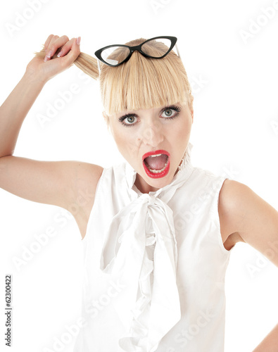 Photo: Crazy blonde business woman in stress situation over white backg Crazy blonde business woman in stress situation over white backg