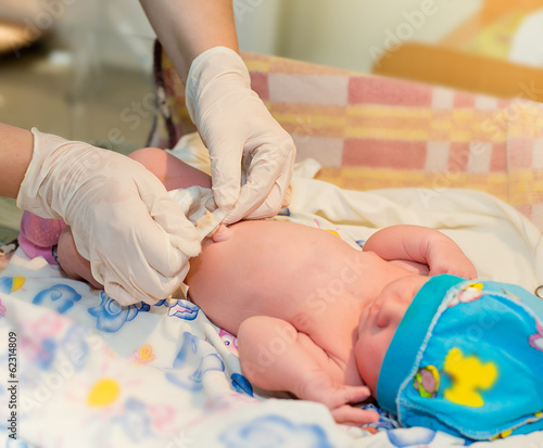 Photo: measurement of the newborn in the hospital measurement of the newborn in the hospital