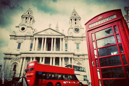 Fototapeta St Paul's Cathedral, red bus, phone booth.London, UK. Vintage