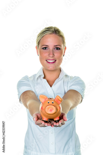 Photo: Frau mit Sparschwein spart Geld Frau mit Sparschwein spart Geld