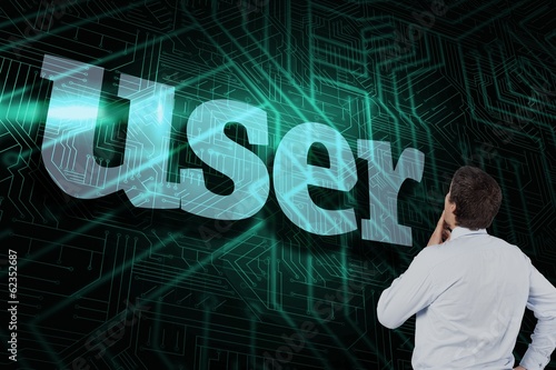 Photo: User against green and black circuit board User against green and black circuit board