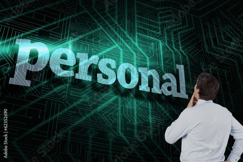 Photo: Personal against green and black circuit board Personal against green and black circuit board
