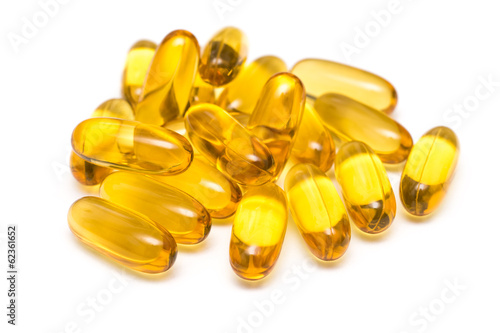 Photo: Transparent Yellow Medicine Capsules Isolated On White Transparent Yellow Medicine Capsules Isolated On White