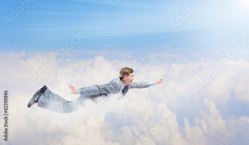 Photo: Flying businessman Flying businessman