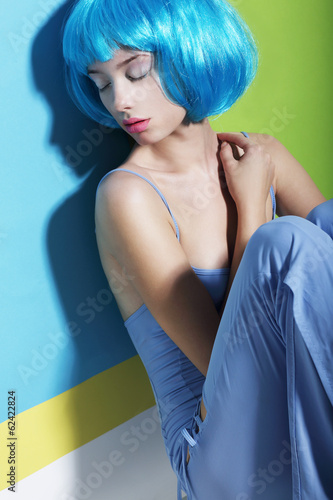 Photo: Daydream. Relaxation. Woman in Blue Wig Sleeping Daydream. Relaxation. Woman in Blue Wig Sleeping