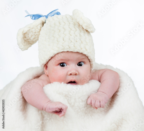 Photo: funny newborn baby dressed in bunny cap funny newborn baby dressed in bunny cap