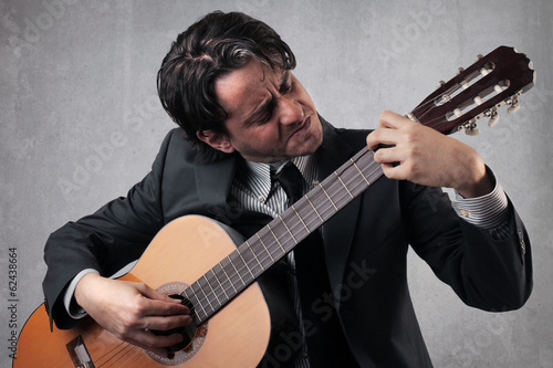 Photo: guitarist businessman guitarist businessman