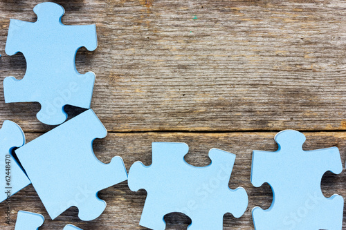 Photo: Puzzle on wooden boards Puzzle on wooden boards
