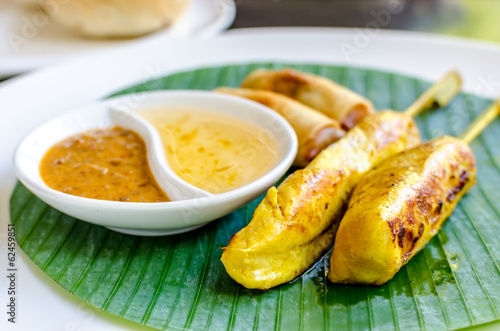 Photo: Vegetables spring roll and chicken satay Vegetables spring roll and chicken satay