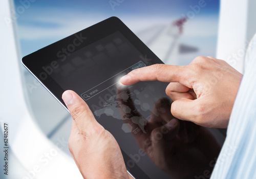Photo: Hands touching tablet with search engine, Social network concept Hands touching tablet with search engine, Social network concept