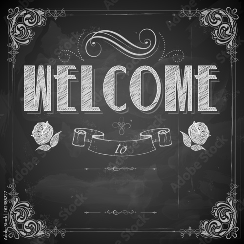 Vector: Welcome written on chalkboard Welcome written on chalkboard