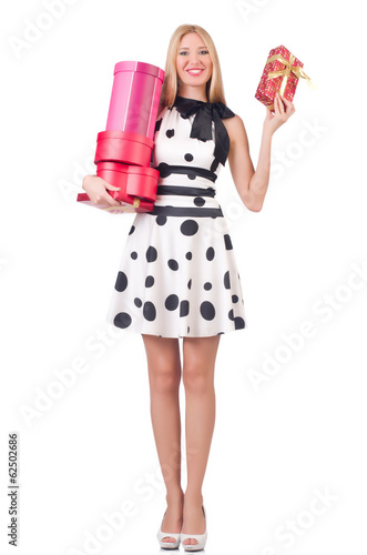 Photo: Young woman with christmas shopping on white Young woman with christmas shopping on white