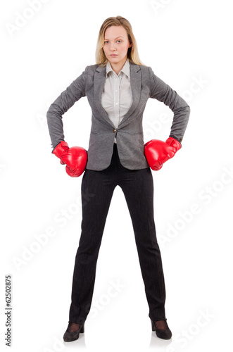 Photo: Woman businesswoman with boxing gloves on white Woman businesswoman with boxing gloves on white