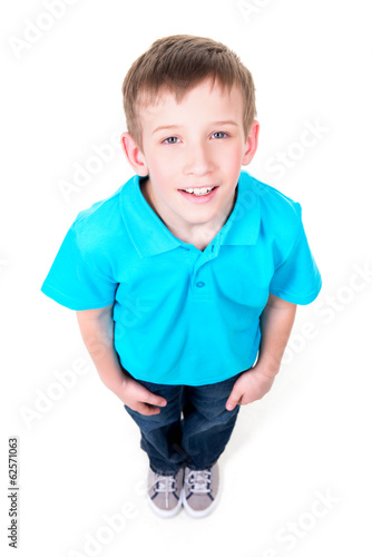 Photo: Portrait of adorable happy boy looking up. Portrait of adorable happy boy looking up.