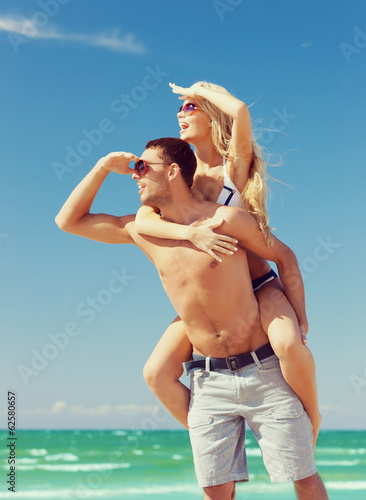 Photo: couple having fun on the beach couple having fun on the beach