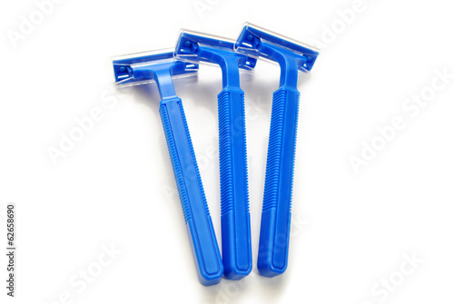 Photo: Blue Disposable Razors Isolated Over White Blue Disposable Razors Isolated Over White