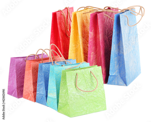 Photo: Colorful shopping bags, isolated on white Colorful shopping bags, isolated on white