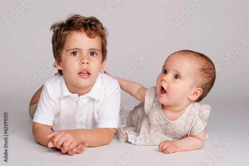 Photo: Baby Girl with her Brother. Baby Girl with her Brother.