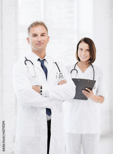 Photo: two doctors in hospital two doctors in hospital