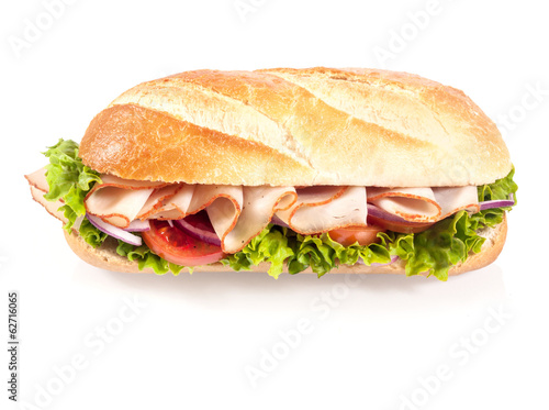 Photo: Crusty French baguette with sliced chicken Crusty French baguette with sliced chicken