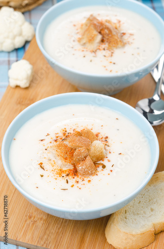 Photo: cold cauliflower soup with cottage cheese and croutons, vertical cold cauliflower soup with cottage cheese and croutons, vertical