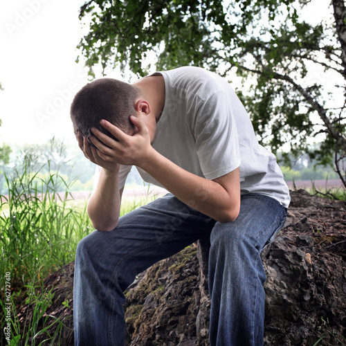 Photo: Sad Young Man outdoor Sad Young Man outdoor