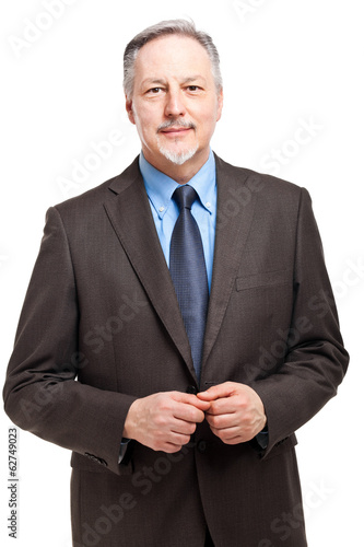 Photo: Smiling businessman isolated on white Smiling businessman isolated on white