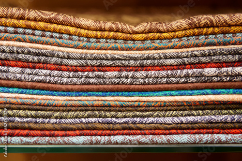 Photo: Cashmere shawls on shop shelf Cashmere shawls on shop shelf