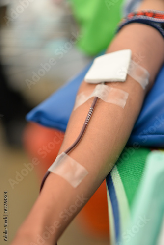 Photo: Man giving blood donation Man giving blood donation