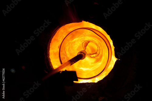 Photo: Glass blowing process Glass blowing process