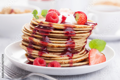 Photo: pancakes with berry and jam pancakes with berry and jam